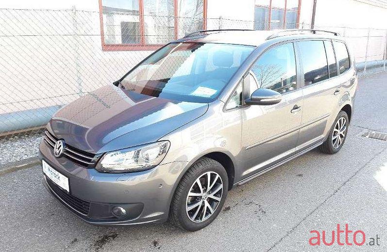 2014' Volkswagen Touran photo #1