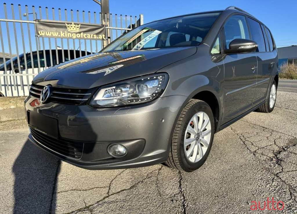 2014' Volkswagen Touran photo #1