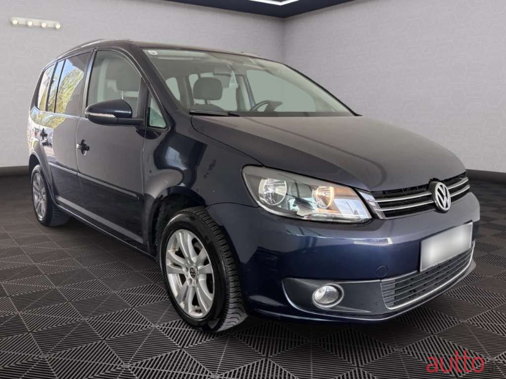 2013' Volkswagen Touran photo #1