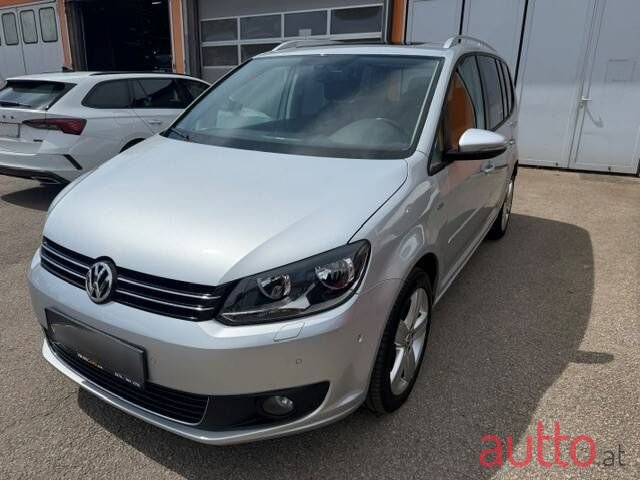 2014' Volkswagen Touran photo #1