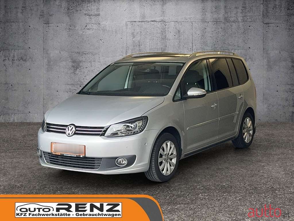 2014' Volkswagen Touran photo #1