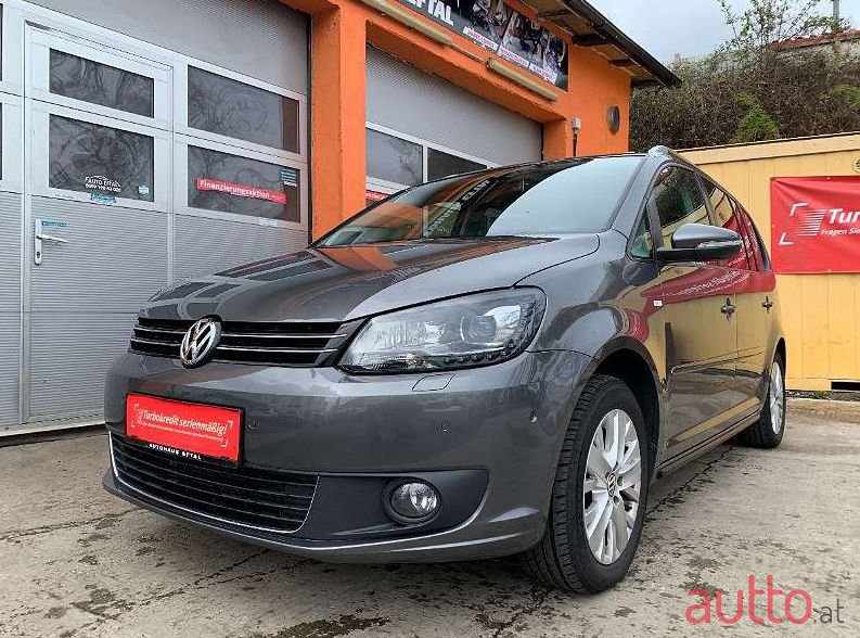 2014' Volkswagen Touran photo #1