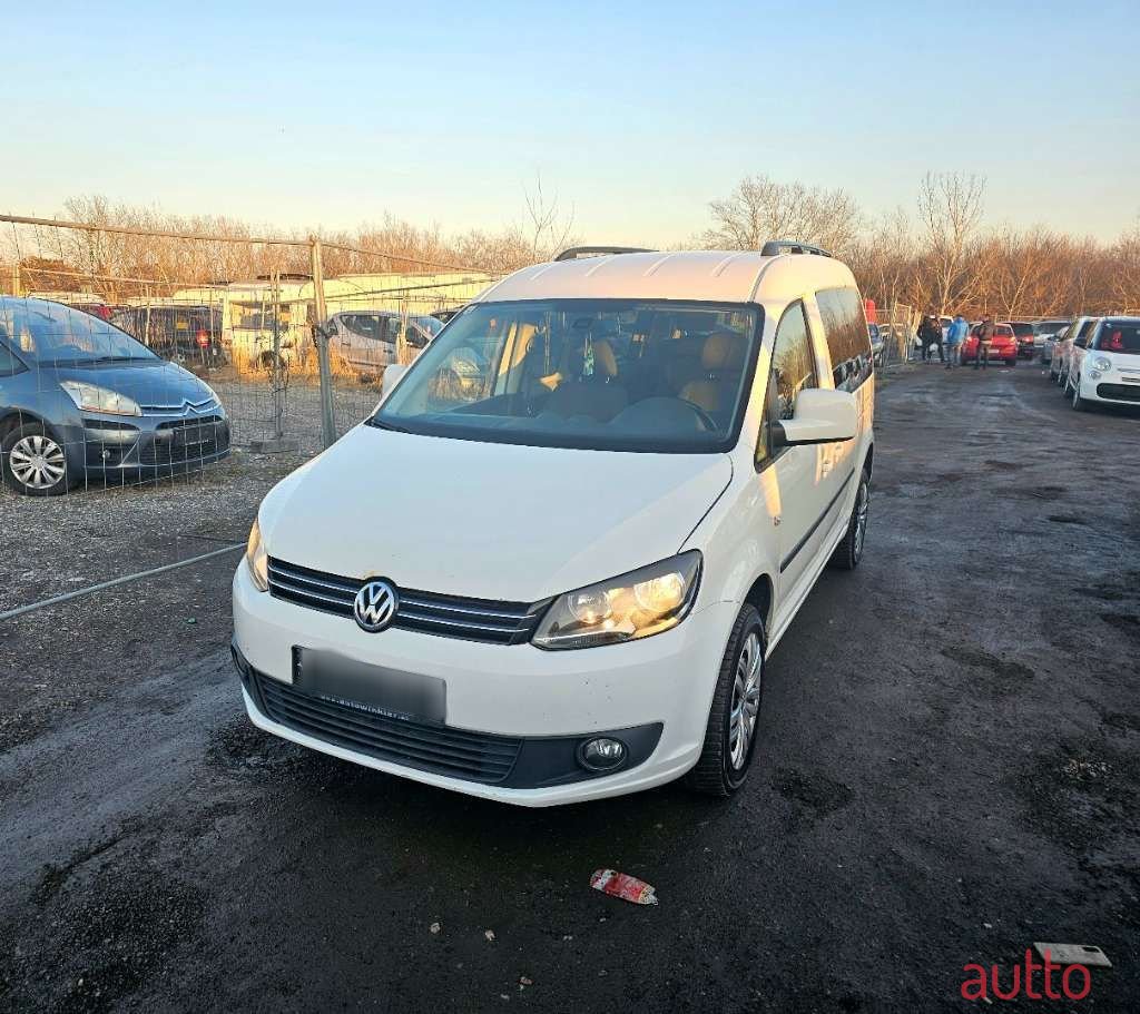 2011' Volkswagen Caddy photo #1