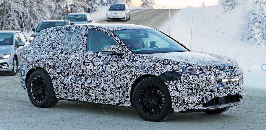 Audi Q6 E-Tron Spied With Full-Body Camo, Fake Lights