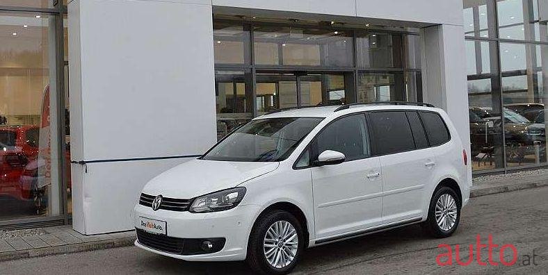 2014' Volkswagen Touran photo #1