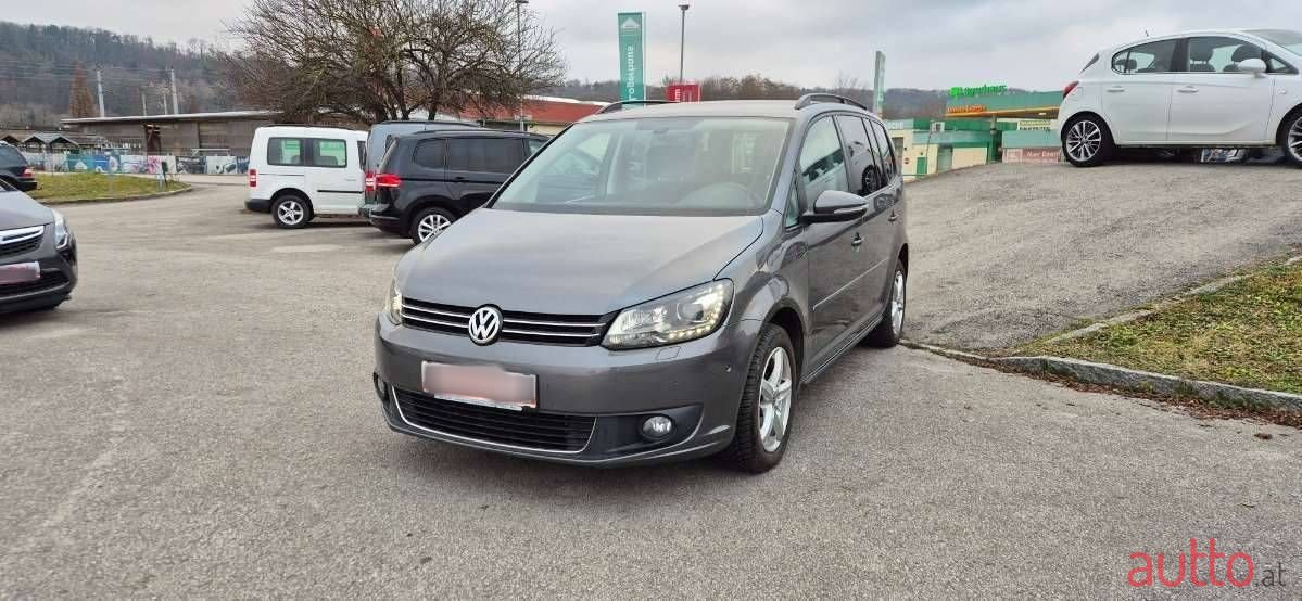 2013' Volkswagen Touran photo #1