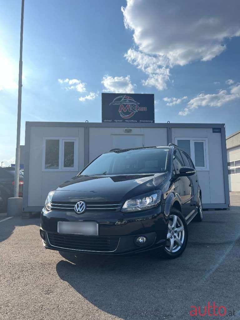 2012' Volkswagen Touran photo #1