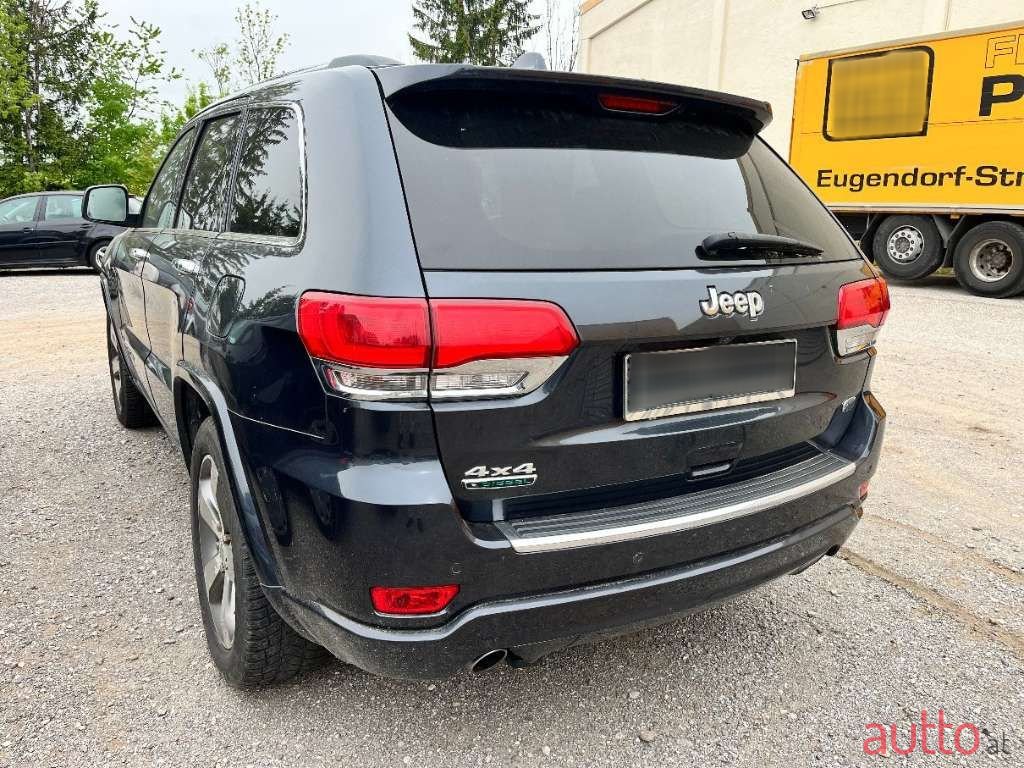 2014' Jeep Grand Cherokee photo #2