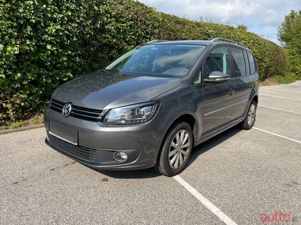 2014' Volkswagen Touran photo #1