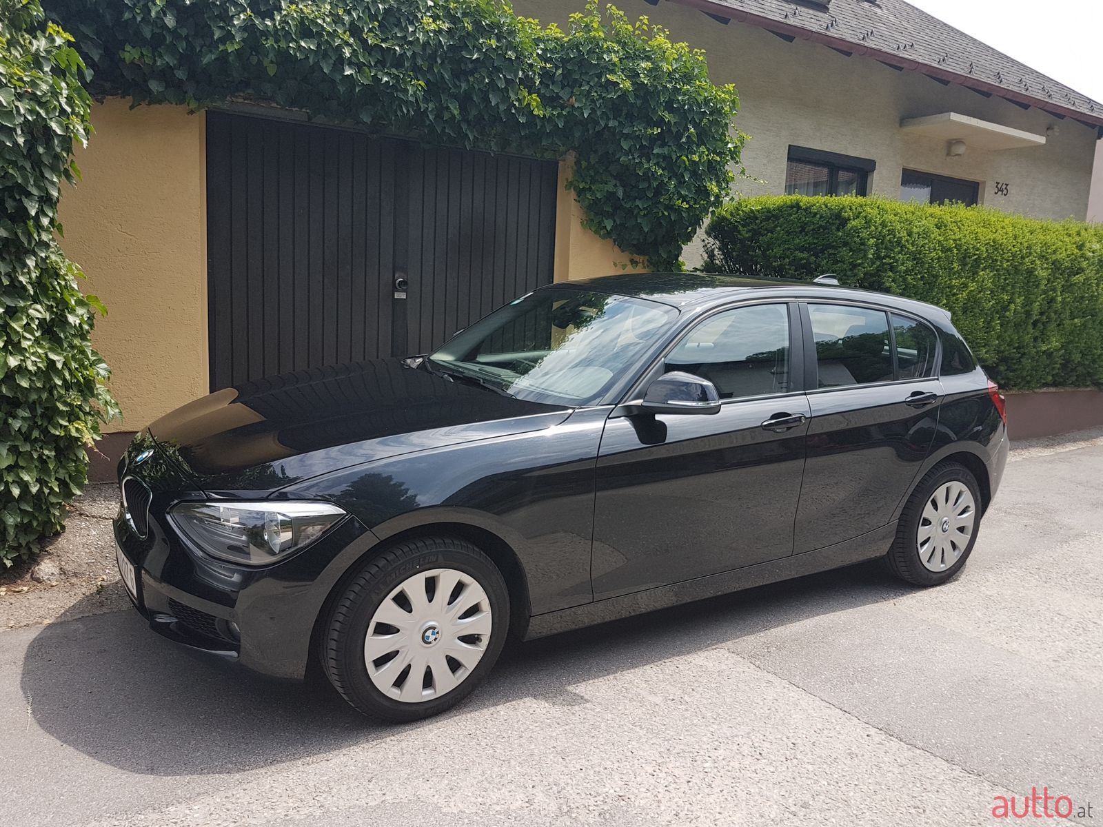 2014' BMW 1 Series 5 Door photo #1