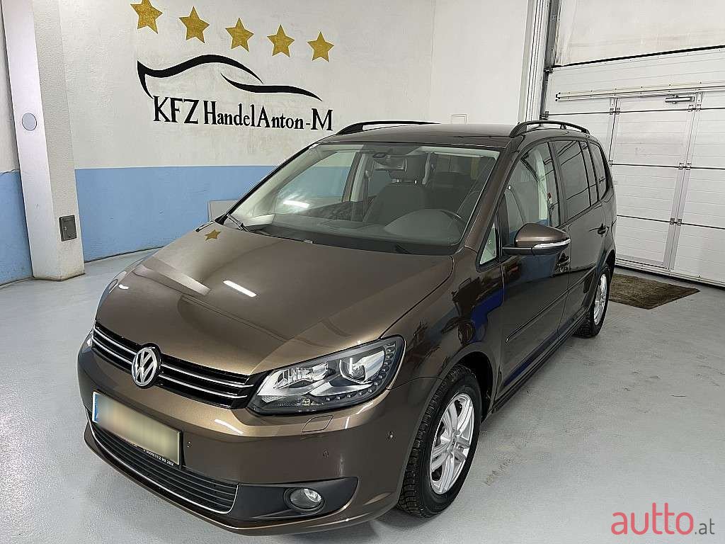 2014' Volkswagen Touran photo #1