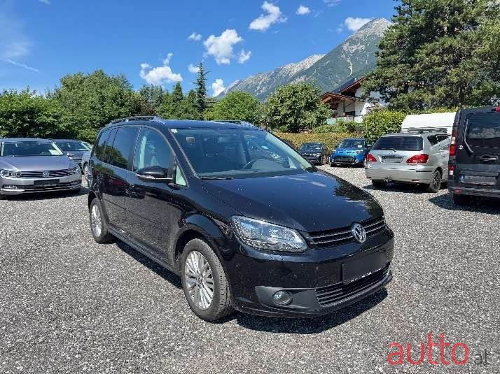 2014' Volkswagen Touran photo #1