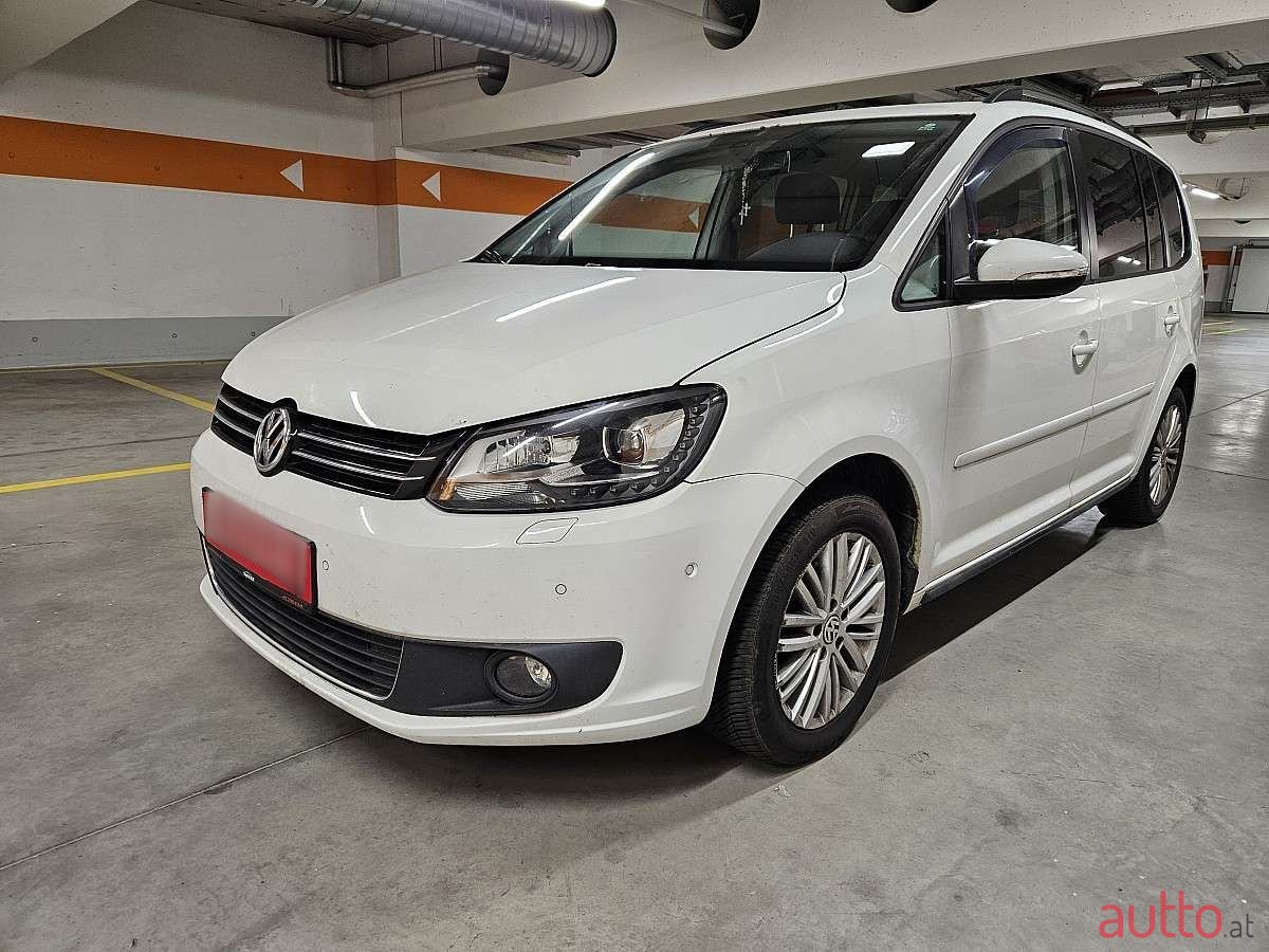 2015' Volkswagen Touran photo #1