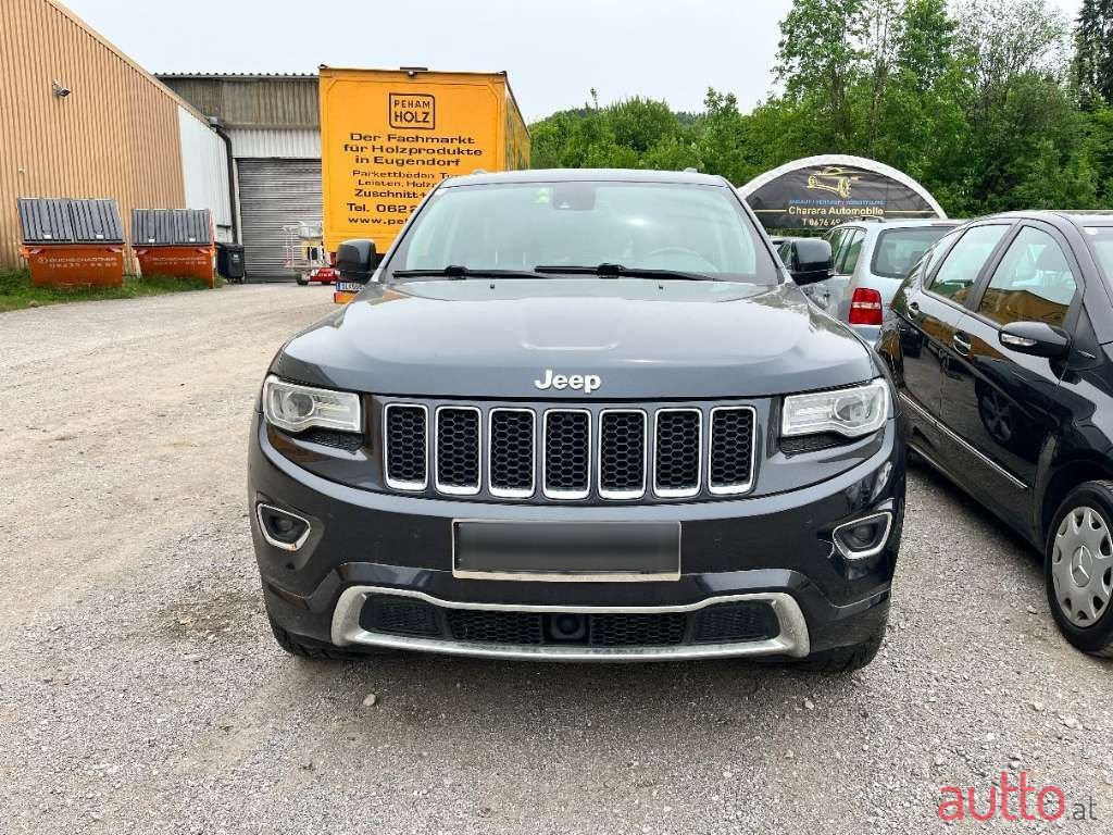 2014' Jeep Grand Cherokee photo #3